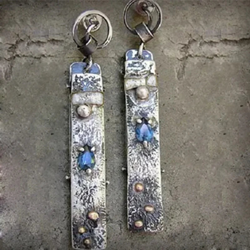 Boucles d'oreilles en pierre bleue faites à la main
