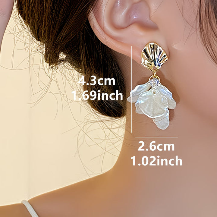 Les Boucles d'Oreilles en Perles Pétales Givrées