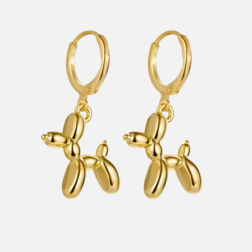 Boucles d'oreilles Huggie en or avec charme de mini chien en ballon