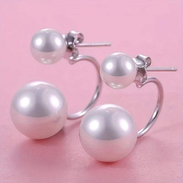 Boucles d'oreilles à déclaration en double perle