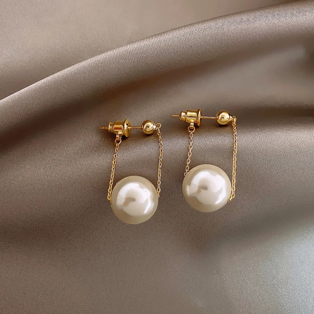 Boucles d'oreilles en or avec perles pendantes