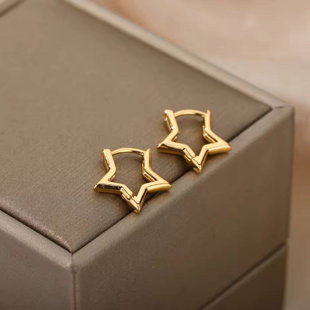 Boucles d'oreilles en or étoile creuse
