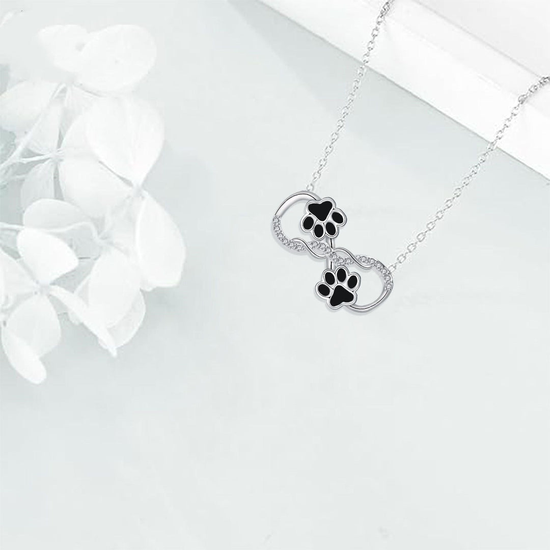 Pendentif en forme de symbole de l'infini avec zirconia