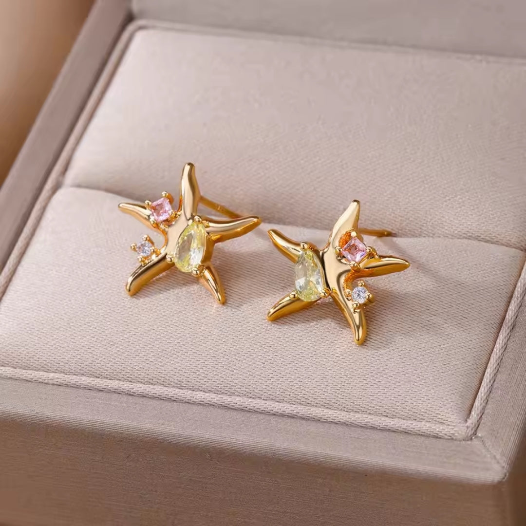 Boucles d'oreilles étoile de mer en or scintillant
