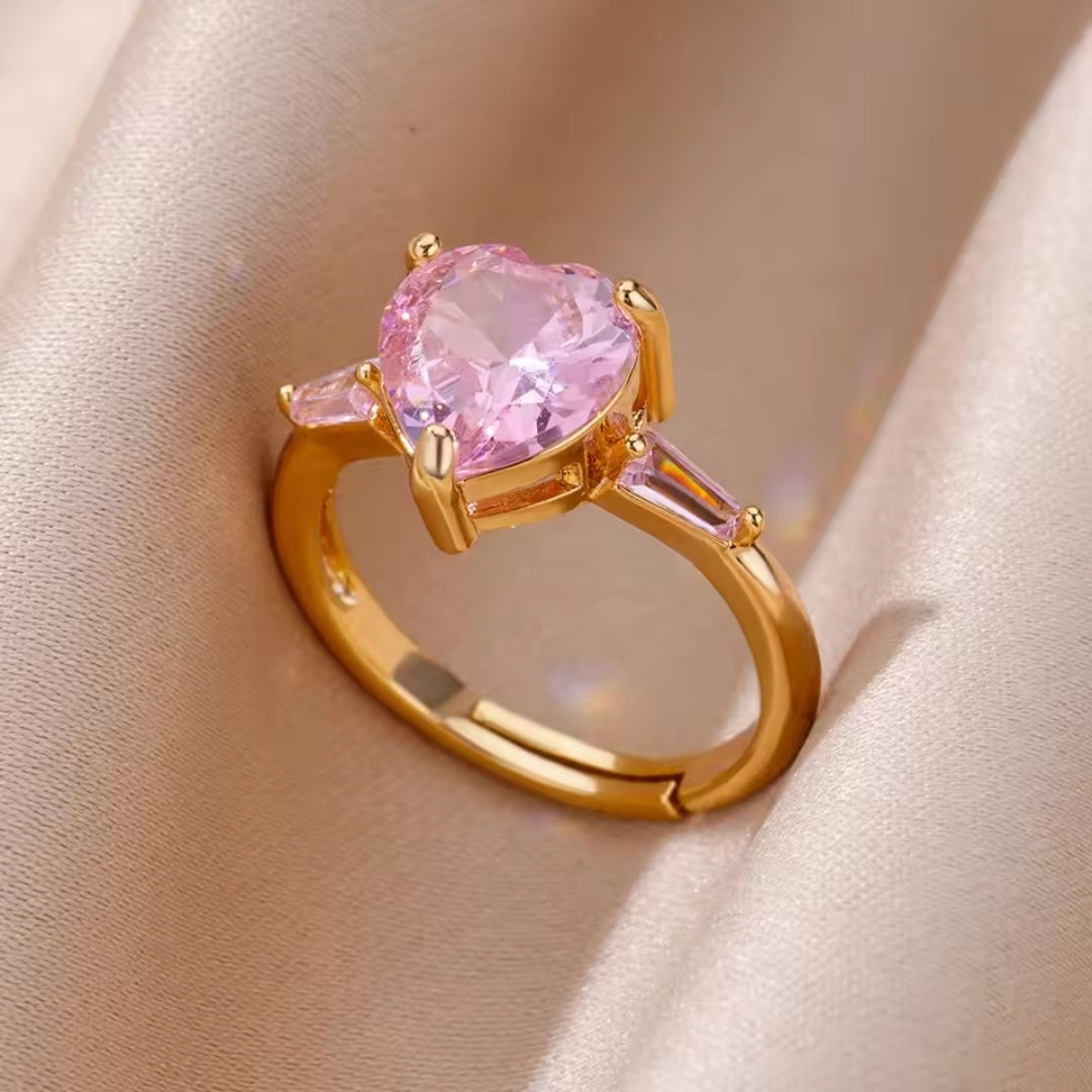 Bague dorée en forme de cœur rose