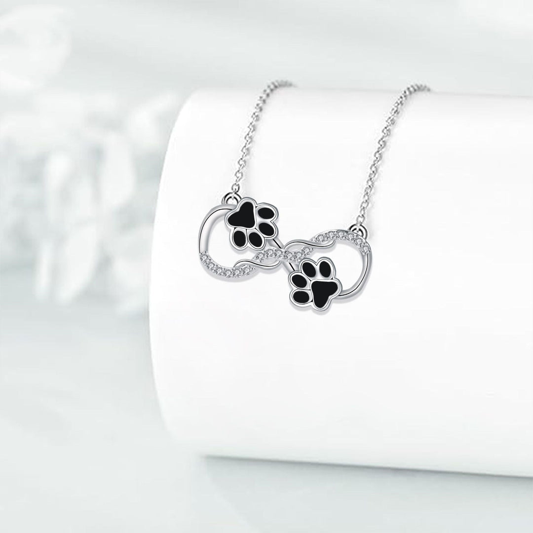 Pendentif en forme de symbole de l'infini avec zirconia