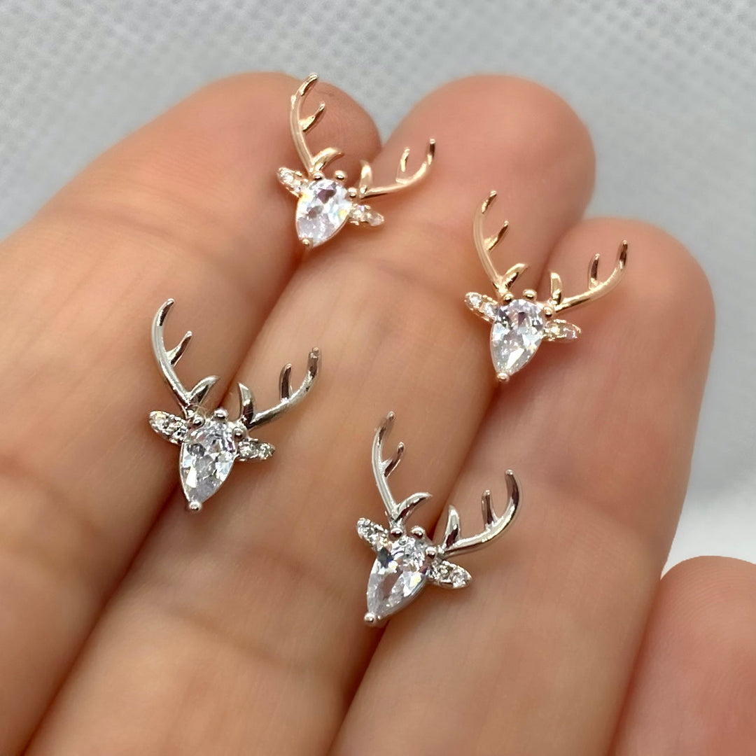 Boucles d'oreilles en corne avec zircon clair