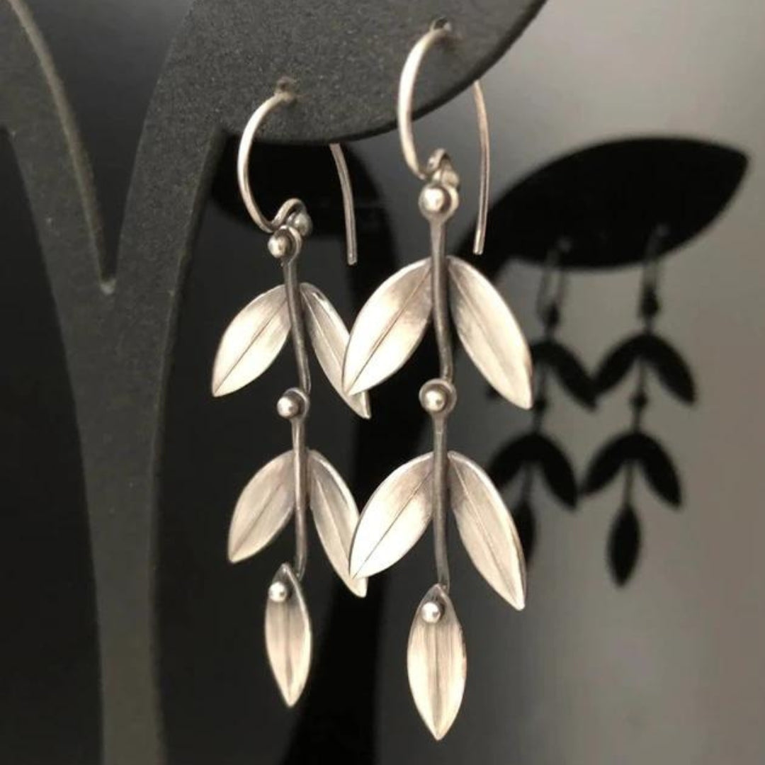 Boucles d'oreilles pendantes en argent boho avec feuilles