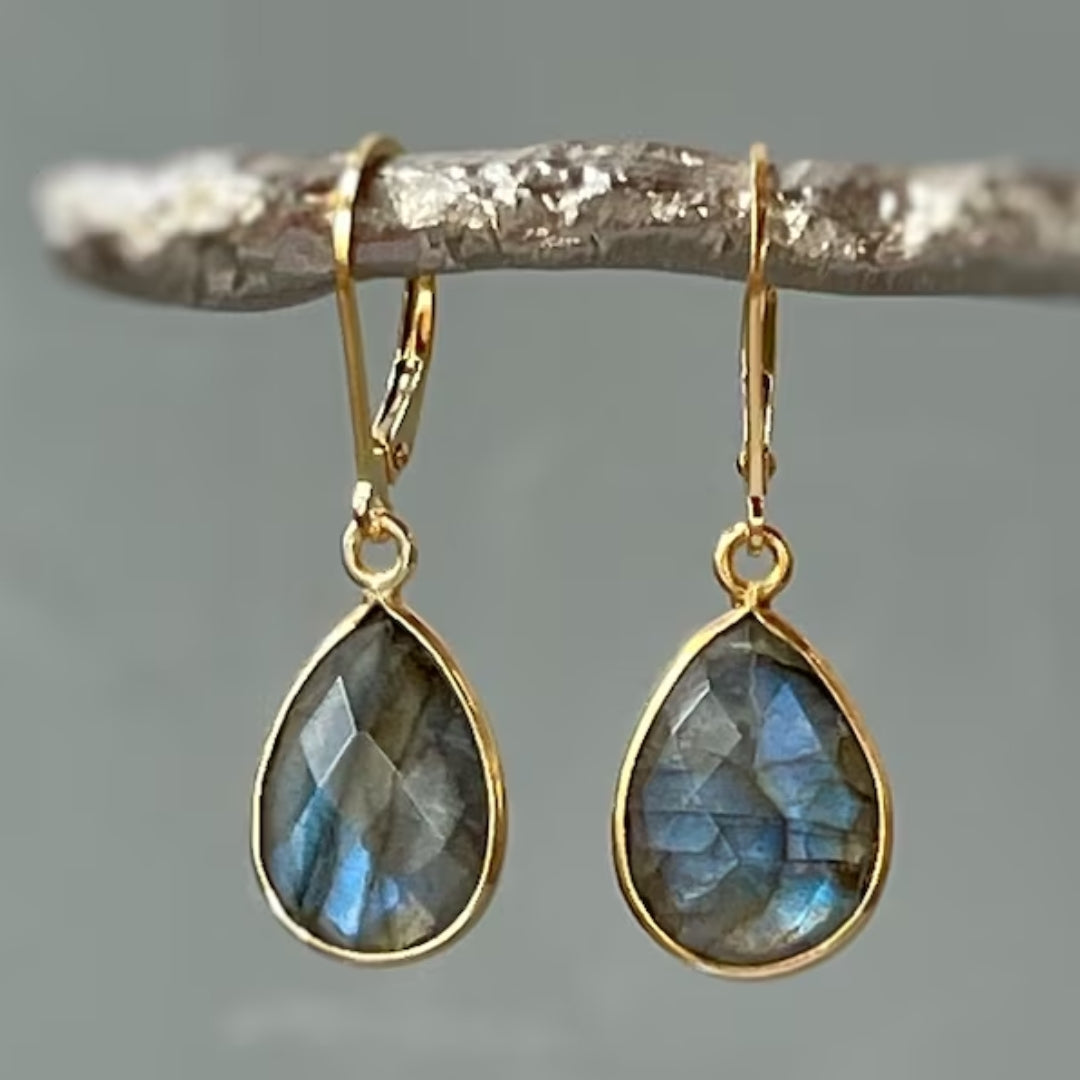 Boucles d'oreilles dorées avec goutte en cristal bleu vintage