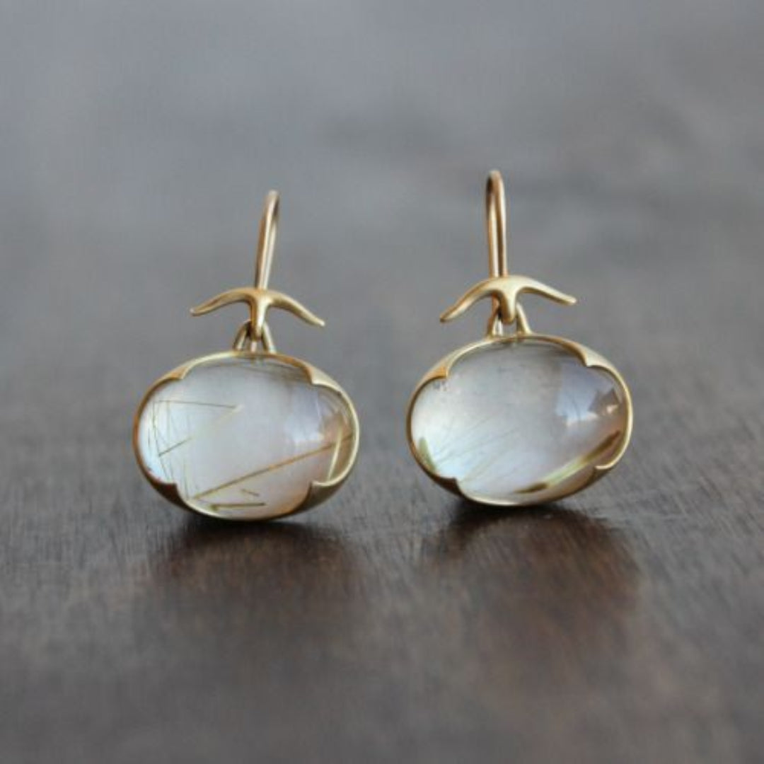 Boucles d'oreilles en or avec pierre de lune vintage