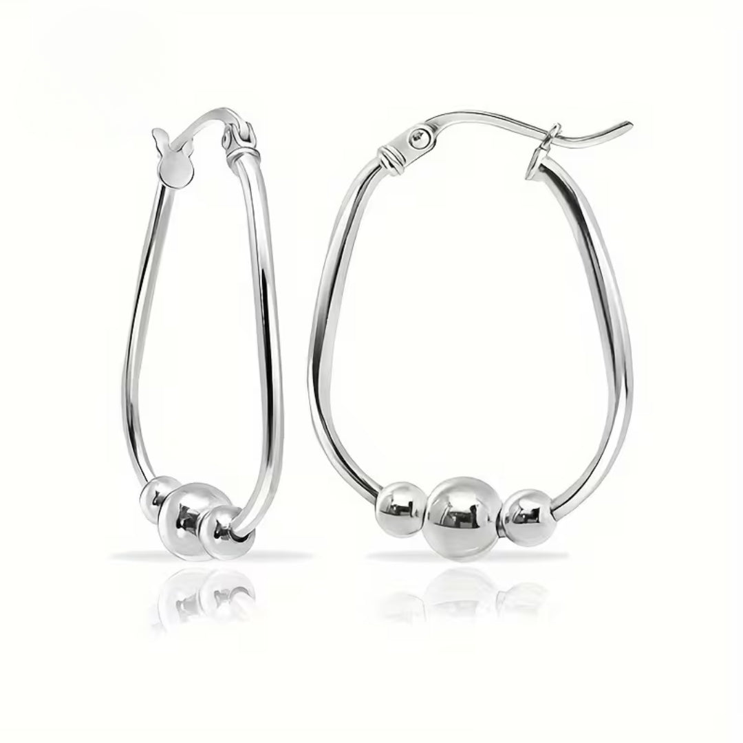 Boucles d'oreilles créoles en perles argentées