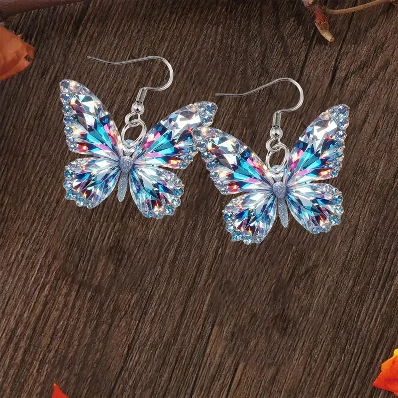 Boucles d'oreilles affirmées en forme de papillon scintillant