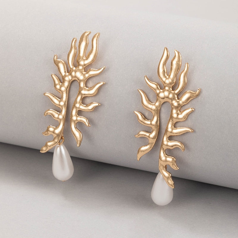 Boucles d'oreilles en corail avec finition en perles d'eau douce