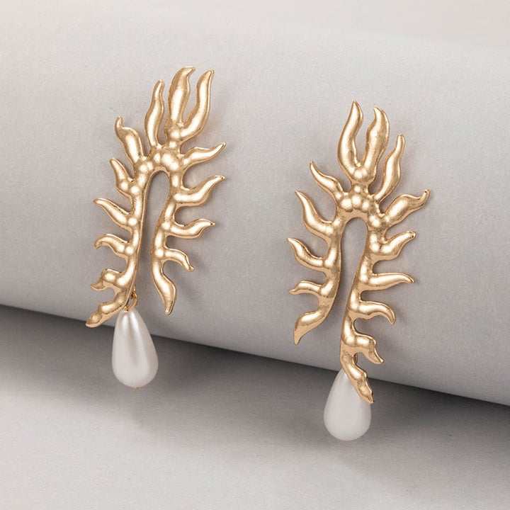 Boucles d'oreilles en corail avec finition en perles d'eau douce