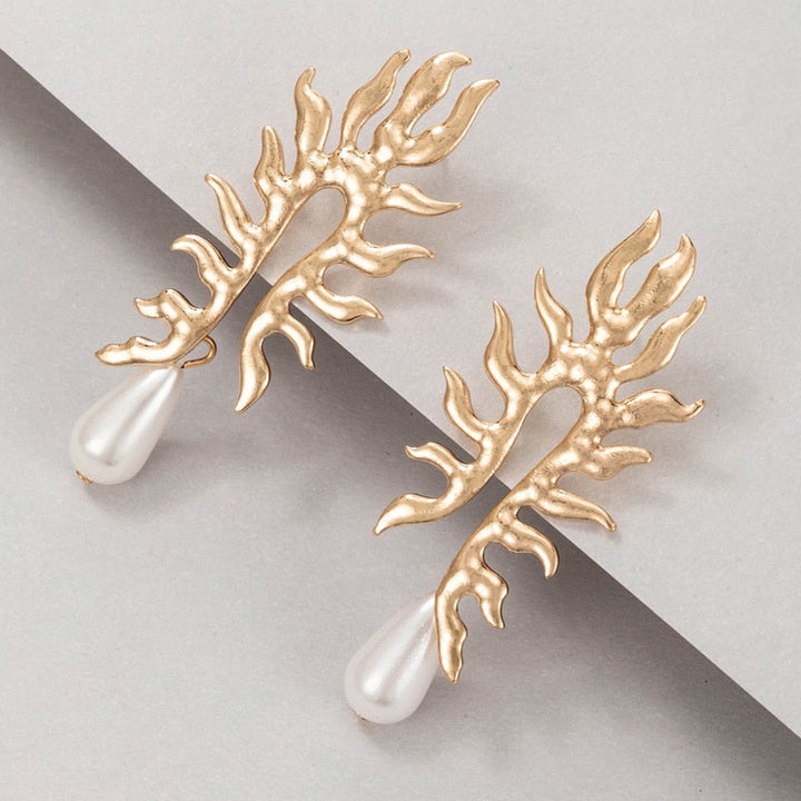 Boucles d'oreilles en corail avec finition en perles d'eau douce