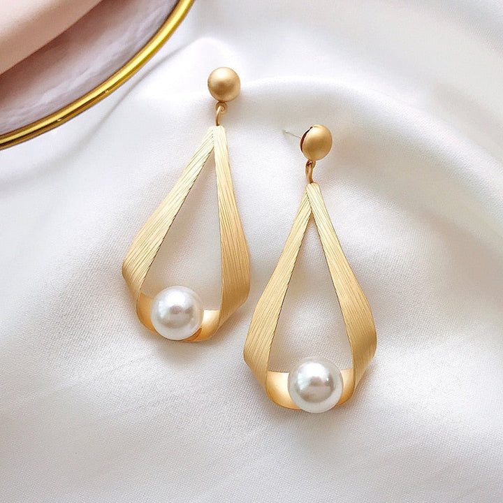 Boucles d'oreilles en cristal rond et perles