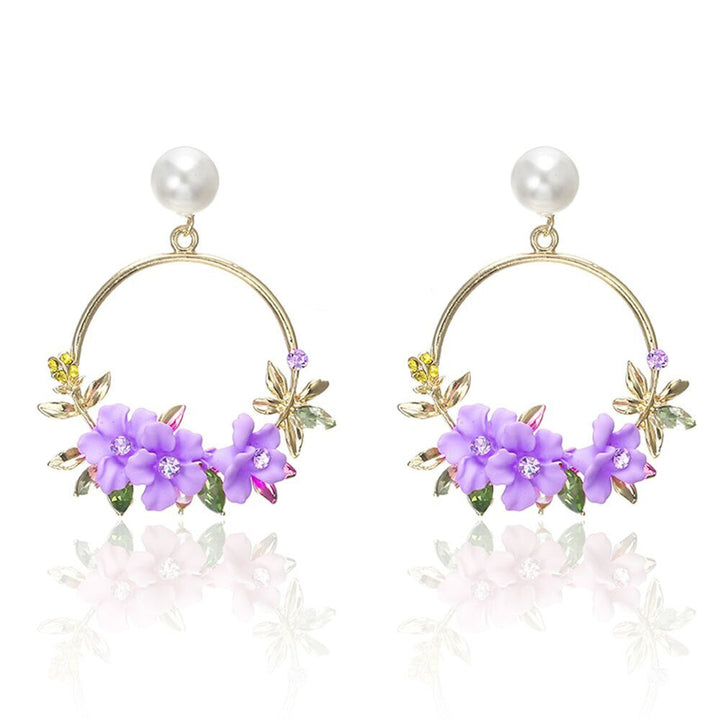 Boucles d'oreilles en or avec fleurs et perles