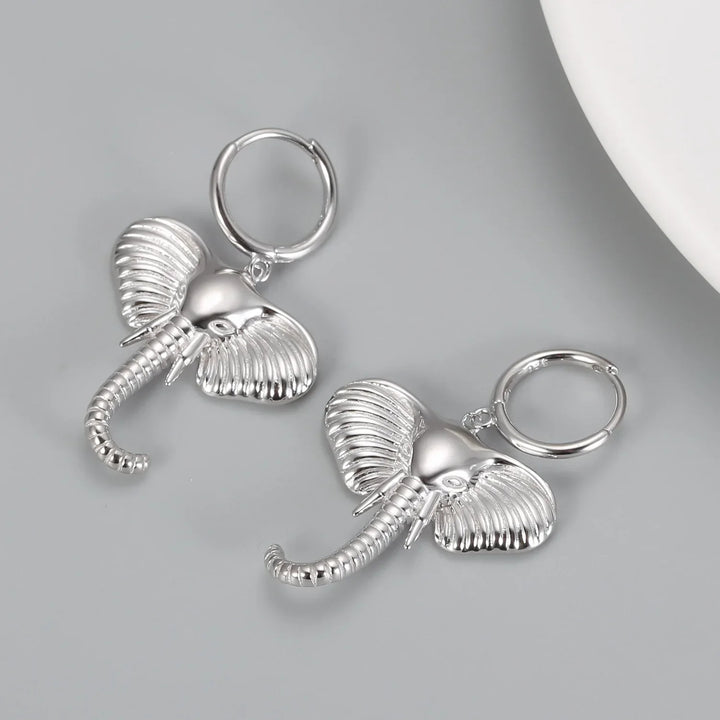 Boucles d'oreilles créoles avec charme éléphant
