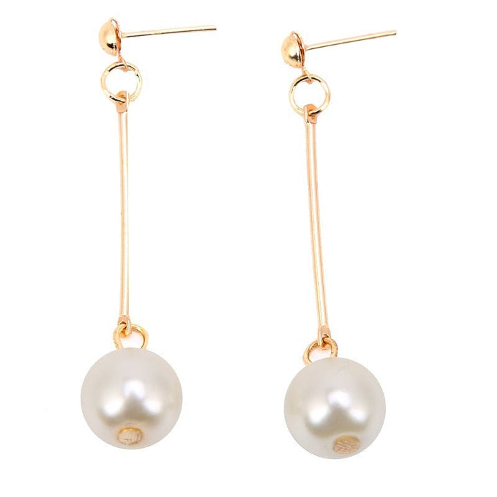 Boucles d'oreilles pendantes de luxe avec des perles plaquées à la main