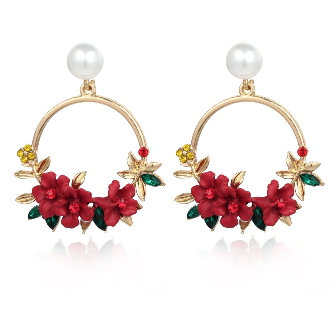 Boucles d'oreilles en or avec fleurs et perles