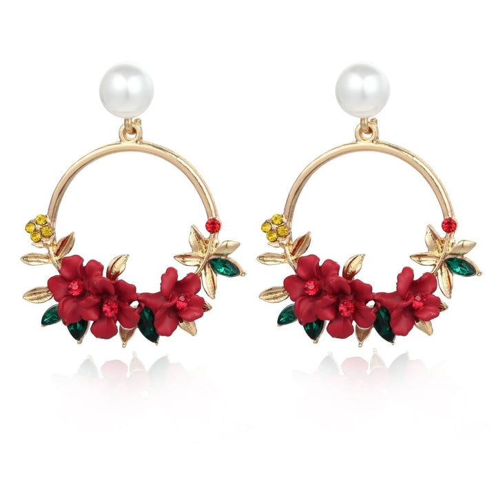 Boucles d'oreilles en or avec fleurs et perles