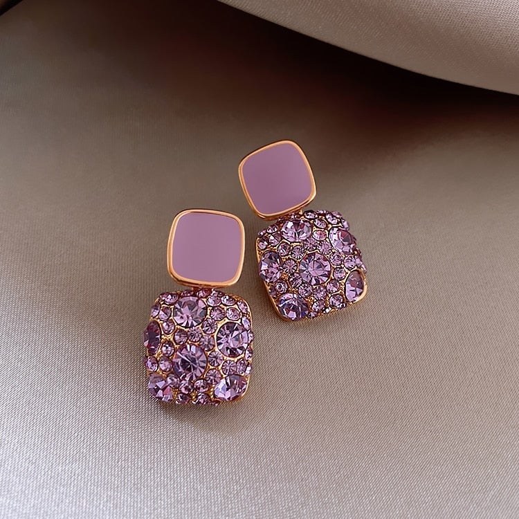 Boucles d'oreilles de luxe violettes avec incrustation de zirconia