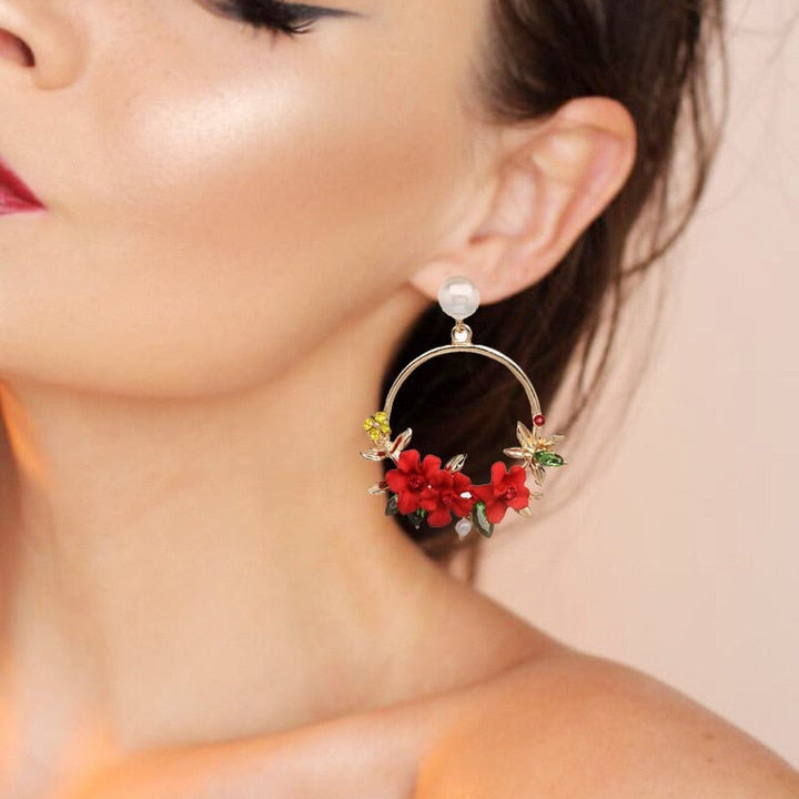Boucles d'oreilles en or avec fleurs et perles
