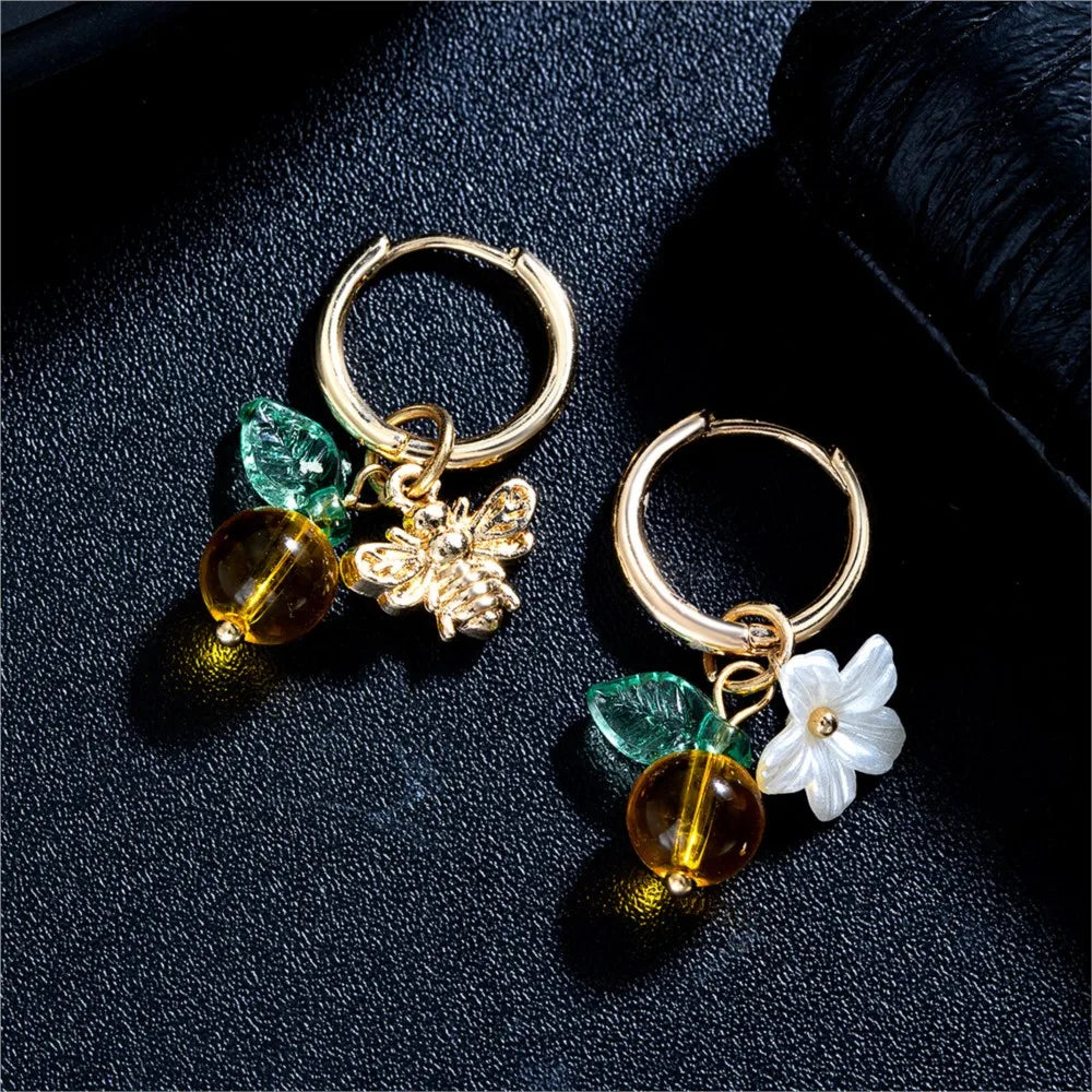 Boucles d'oreilles en forme de cerceau avec fleurs d'oranger