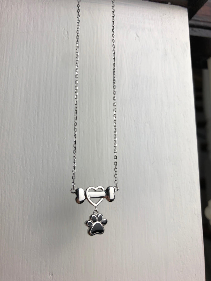 Collier délicat en acier inoxydable en forme de patte de chien