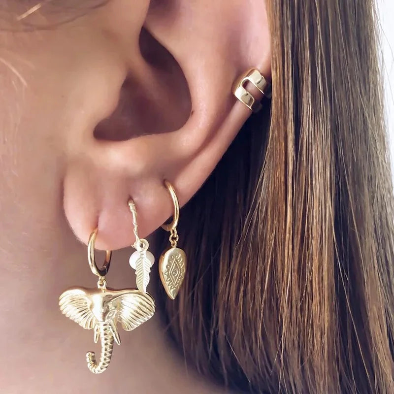 Boucles d'oreilles créoles avec charme éléphant