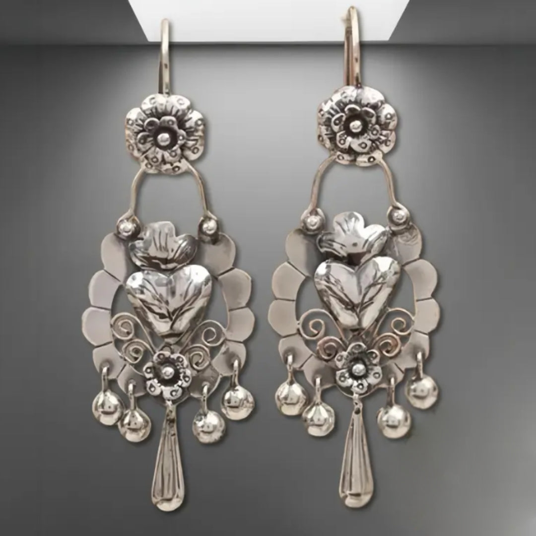 Boucles d'oreilles goutte en argent avec cœur suspendu