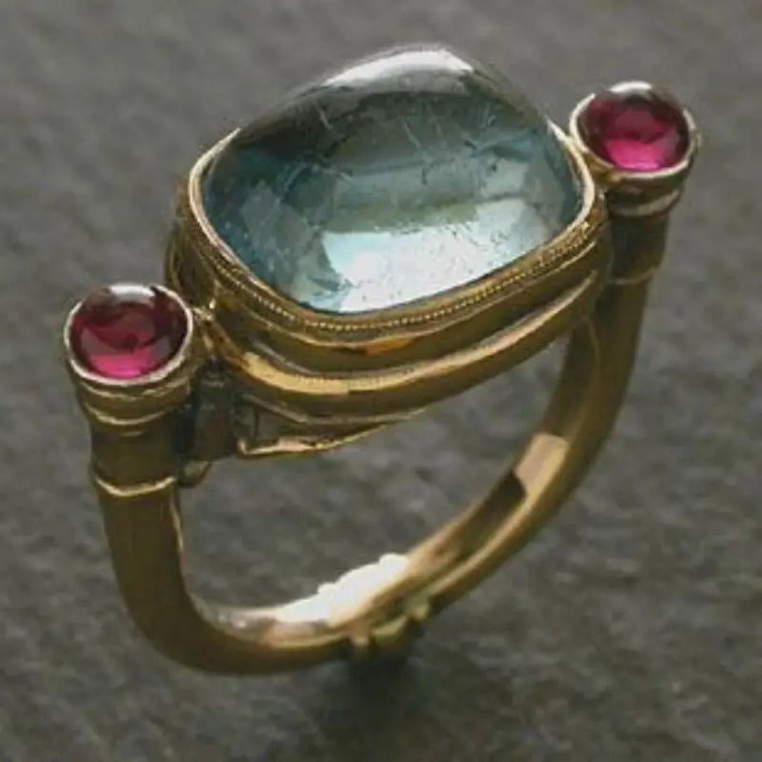 Bague en verre bleu et grenat