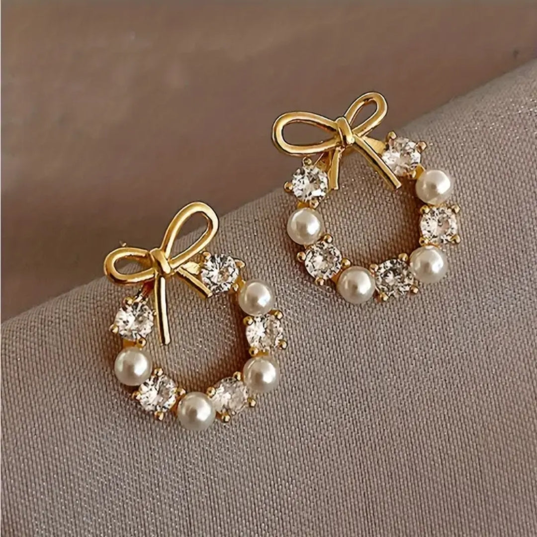 Boucles d'oreilles en perles avec cravate dorée