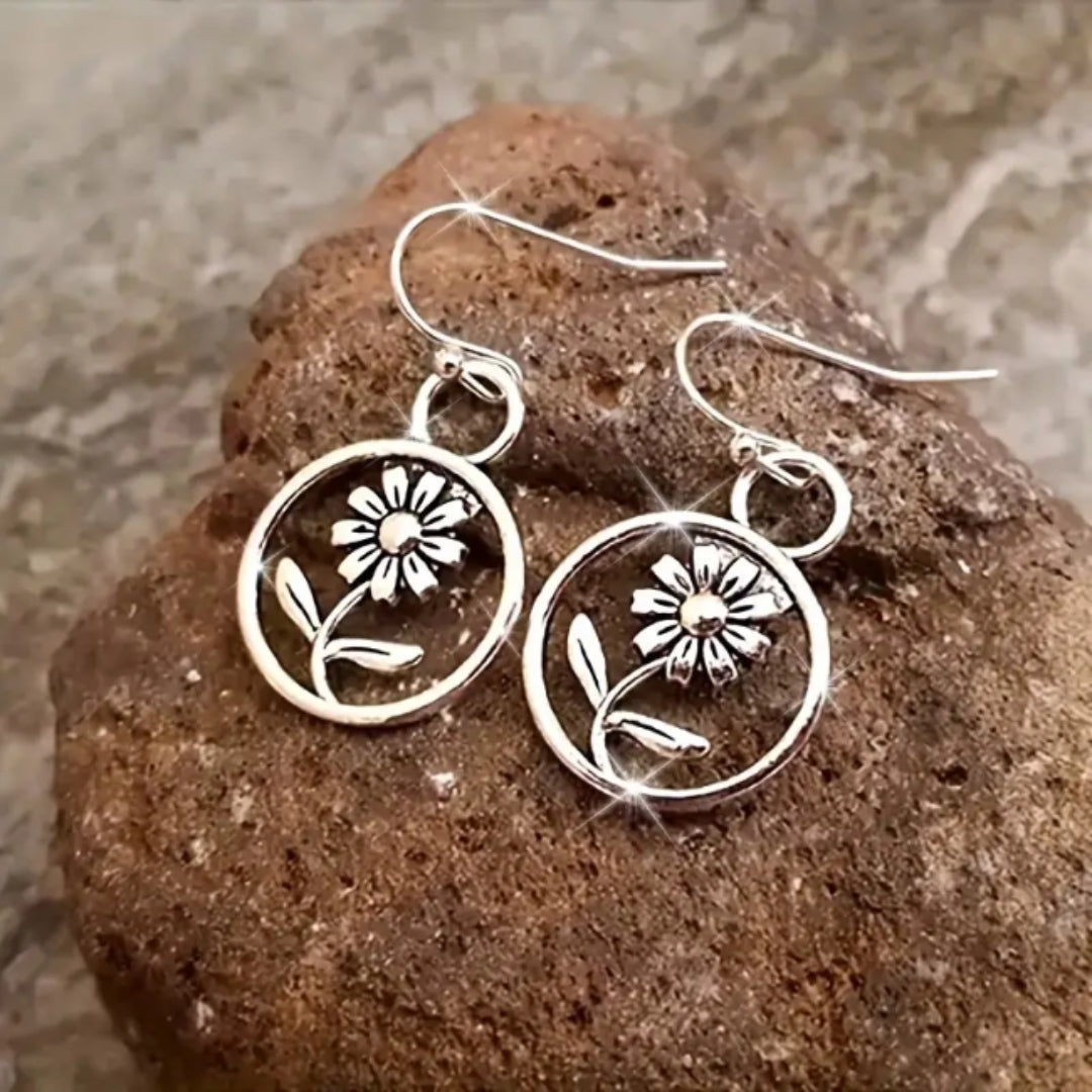 Boucles d'oreilles pendantes en argent rond en forme de fleur