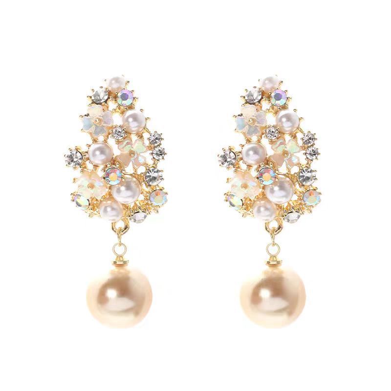 Boucles d'oreilles élégantes en perles de fleurs | Or