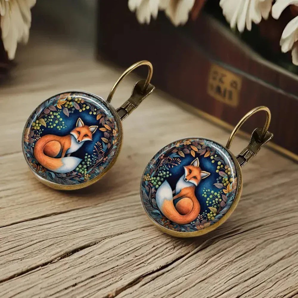 Boucles d'oreilles en verre avec dôme animal fantaisiste