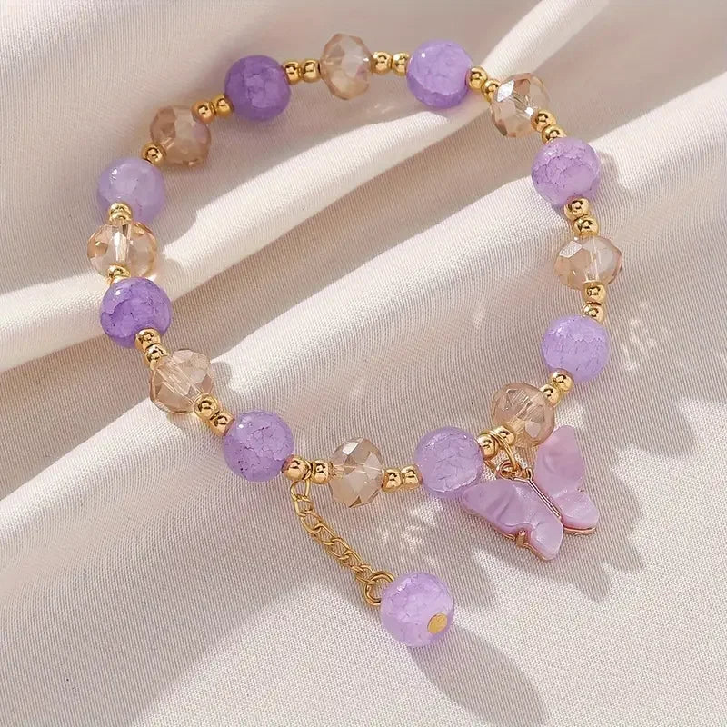 Bracelet extensible en perles avec beau papillon
