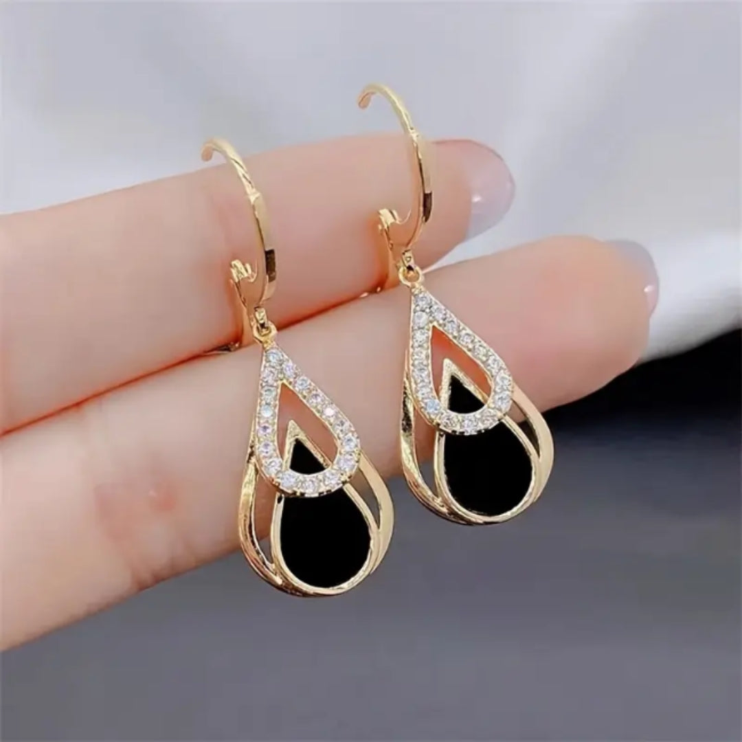 Boucles d'oreilles en zirconium noir et or