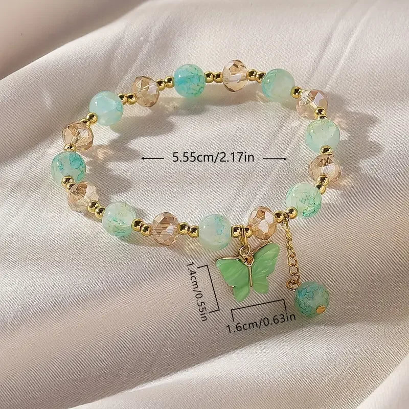 Magnifique bracelet en perles extensible en forme de papillon