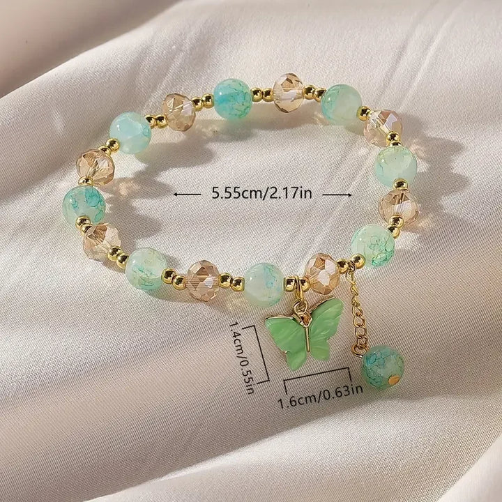 Magnifique bracelet en perles extensible en forme de papillon