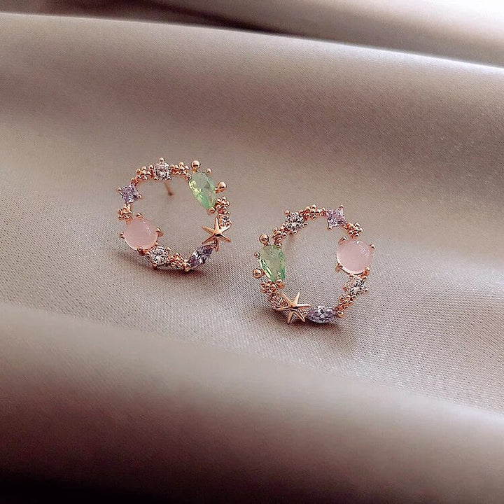 Boucles d'oreilles florales en or rose