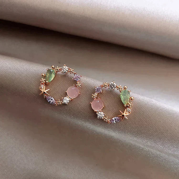 Boucles d'oreilles florales en or rose