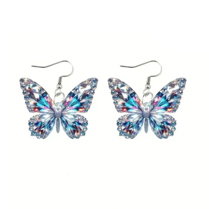 Boucles d'oreilles affirmées en forme de papillon scintillant