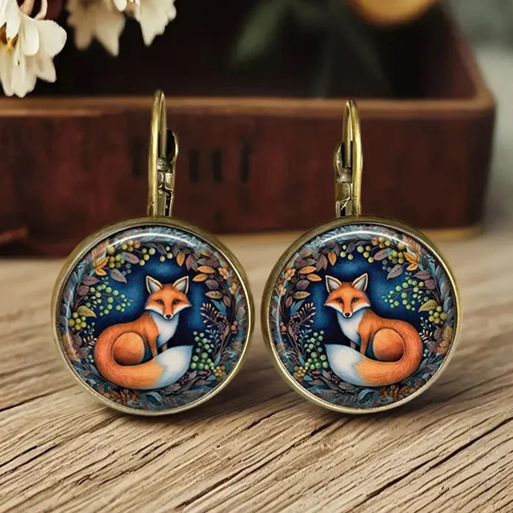 Boucles d'oreilles en verre avec dôme animal fantaisiste