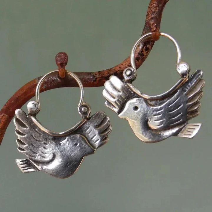 Boucles d'oreilles pendantes inspirées des oiseaux bohèmes – Ton argent