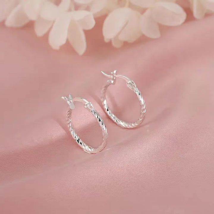 Boucles d'oreilles en argent à anneau tordu
