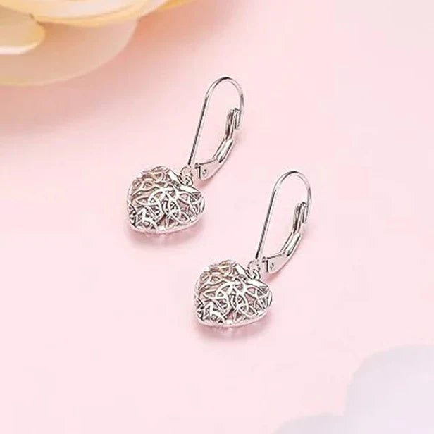 Boucles d'oreilles en forme de cœur creux en argent