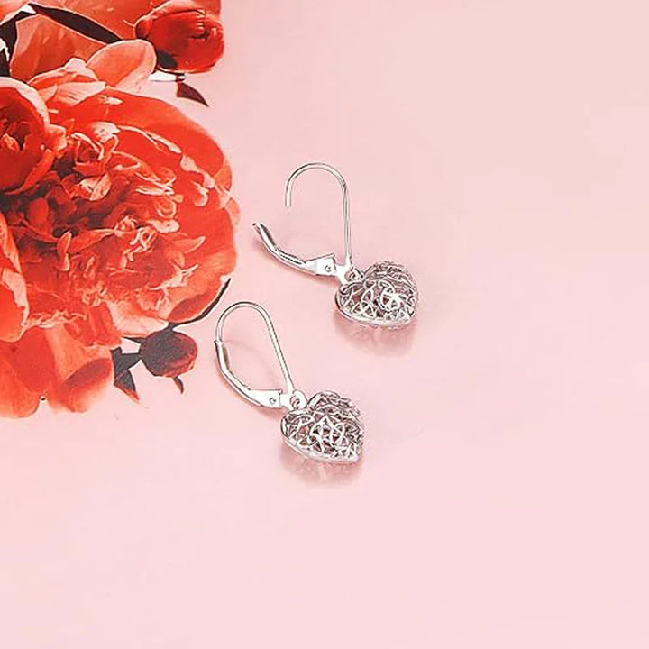 Boucles d'oreilles en forme de cœur creux en argent