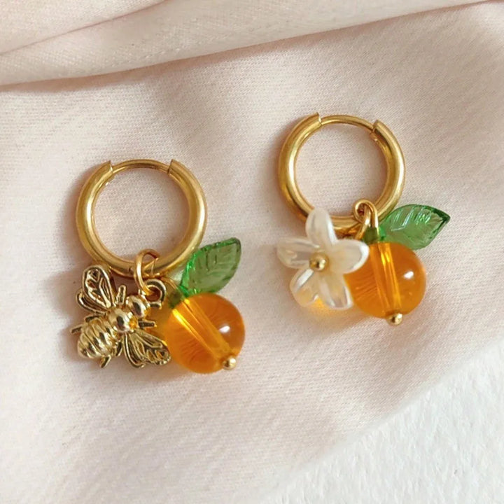 Boucles d'oreilles en forme de cerceau avec fleurs d'oranger
