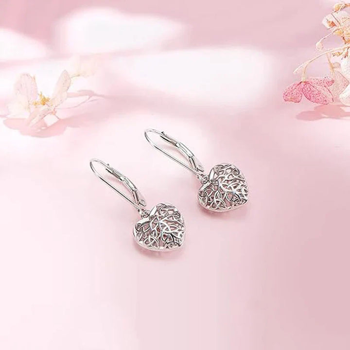 Boucles d'oreilles en forme de cœur creux en argent